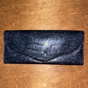 Black snakeskin clutch